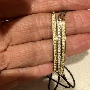 2-gold tone and 1 silver tone adjustable Swarovski crystal bracelets